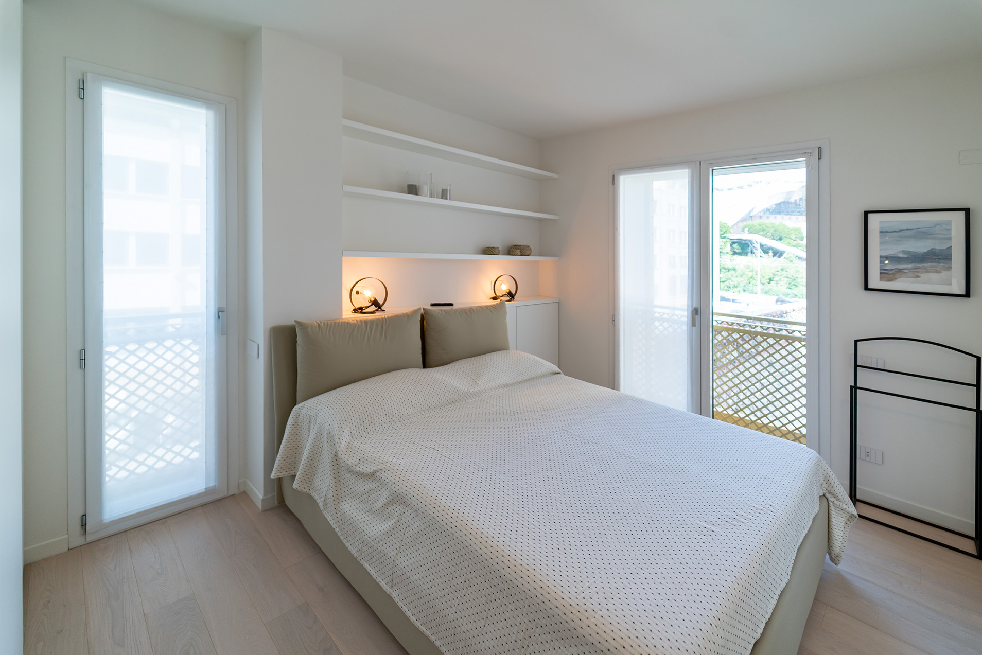 camera da letto bilocale city life milano